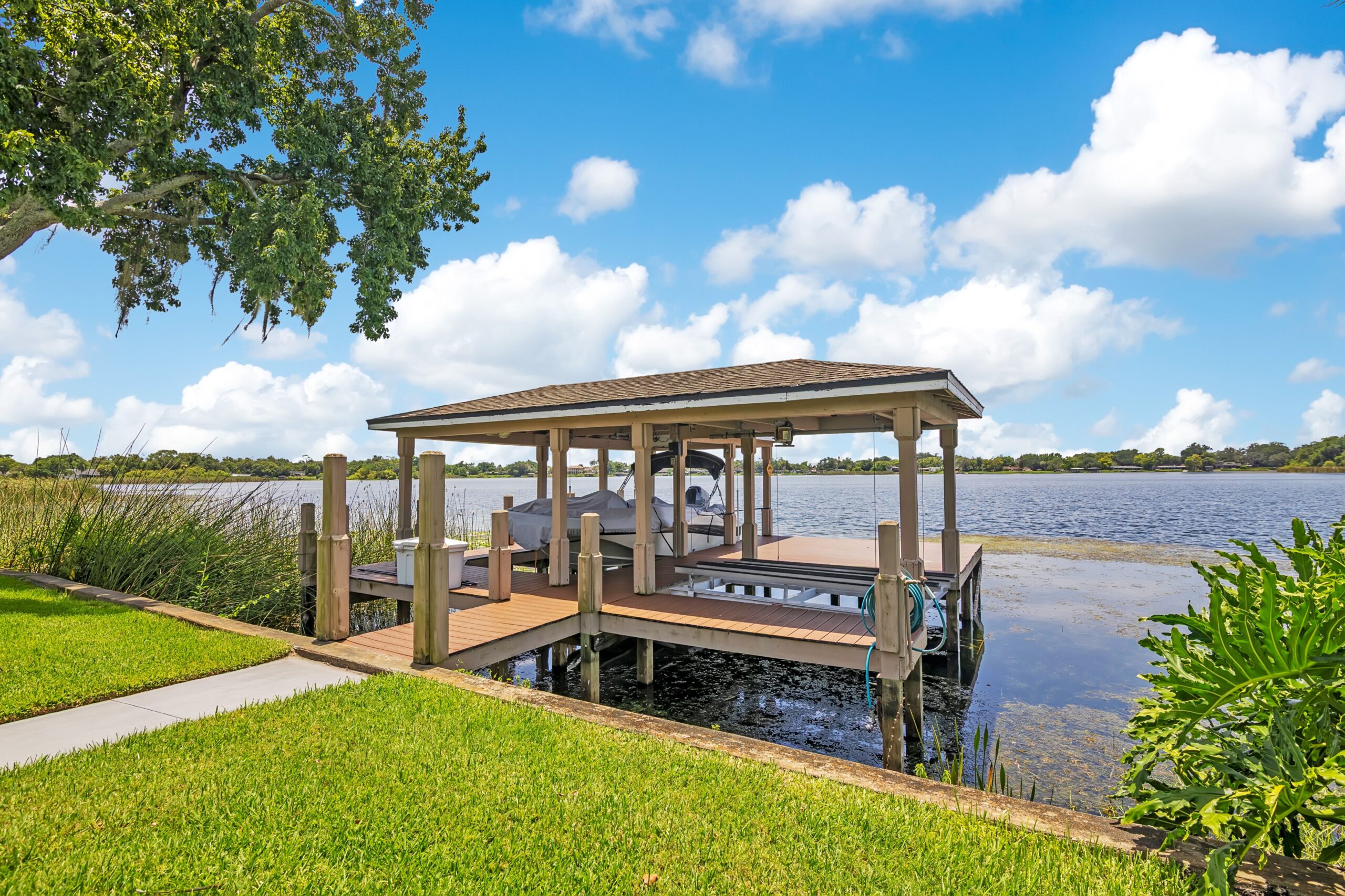 Private covered boat dock on Lake Holden Orlando lakefront
